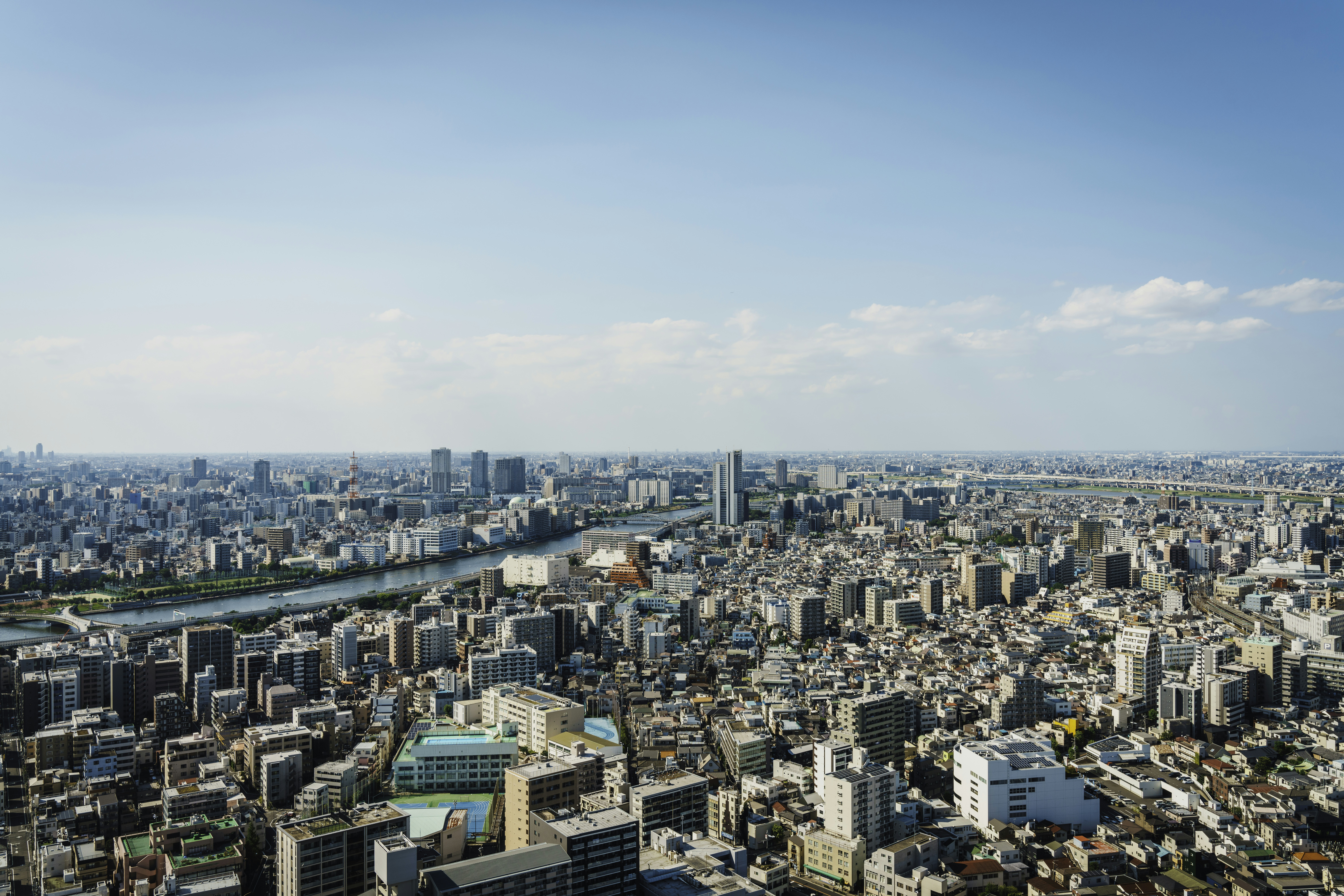 a view of a city from a tall building, 