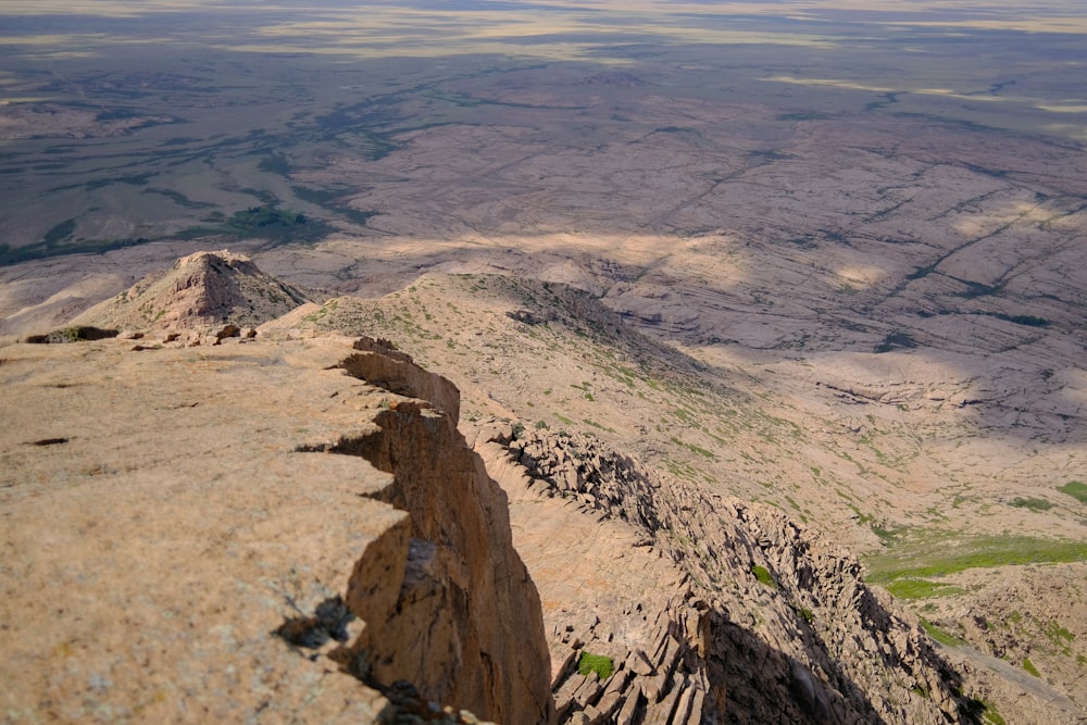 a view of a mountain range from the top of a mountain