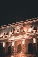 Historic hotel facade bathed in warm evening glow.