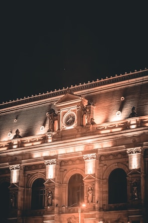 Historic hotel facade bathed in warm evening glow.