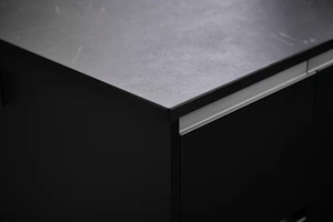 Close-up of a melamine table surface showing its smooth, easy-to-clean finish