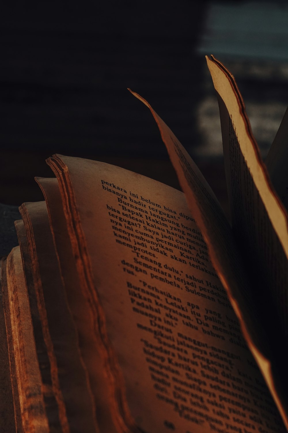 an open book sitting on top of a table