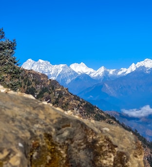 A scenic view of Ecuadorian Andes mountains with a clear blue sky.