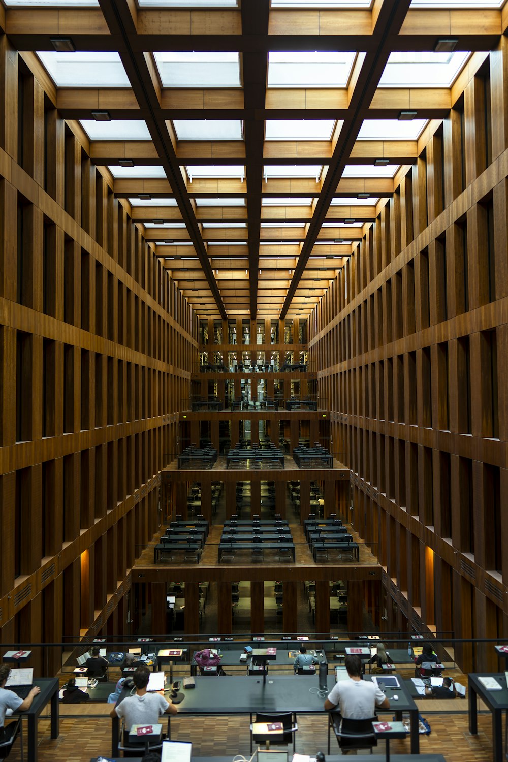 a large room filled with lots of tables and chairs