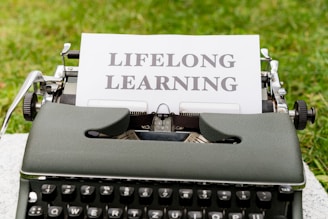 a close up of a typewriter with a sign on it