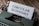 A vintage typewriter with a sheet of paper that has the words 'CIRCULAR ECONOMY' typed on it, set on a wooden surface.