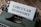 A vintage typewriter with a sheet of paper that has the words 'CIRCULAR ECONOMY' typed on it, set on a wooden surface.