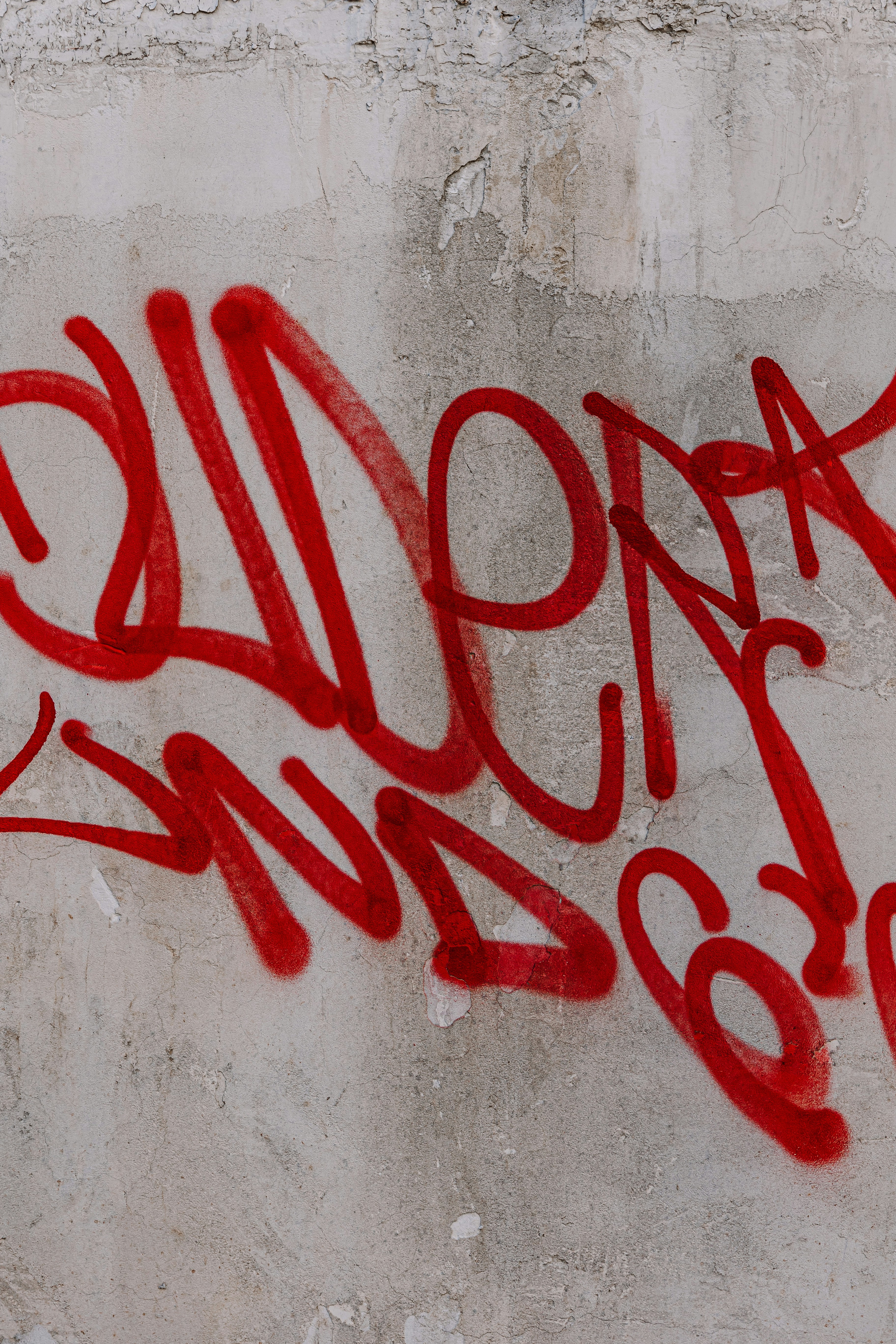 a wall that has some graffiti on it