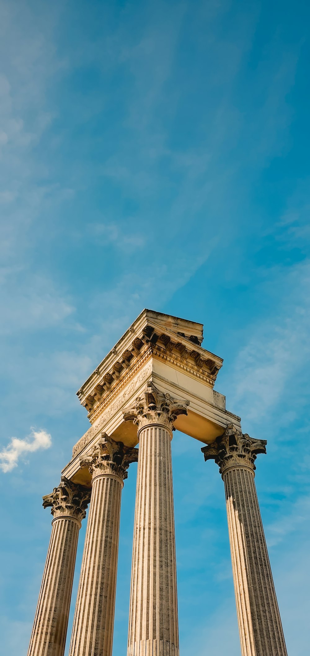 a tall pillar with two columns on top of it