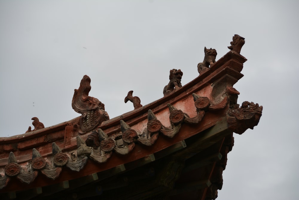 the roof of a building with a sky in the background