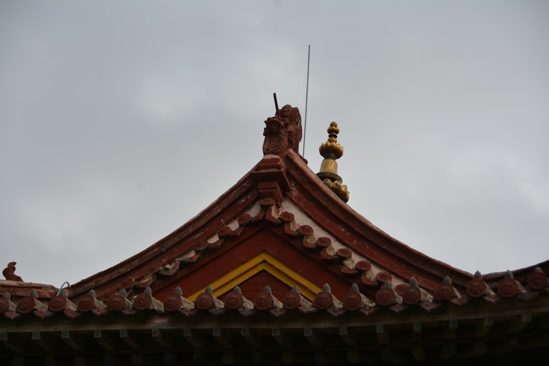 a roof with a weather vane on top of it, Mongolia Ancient Ulanbaataar