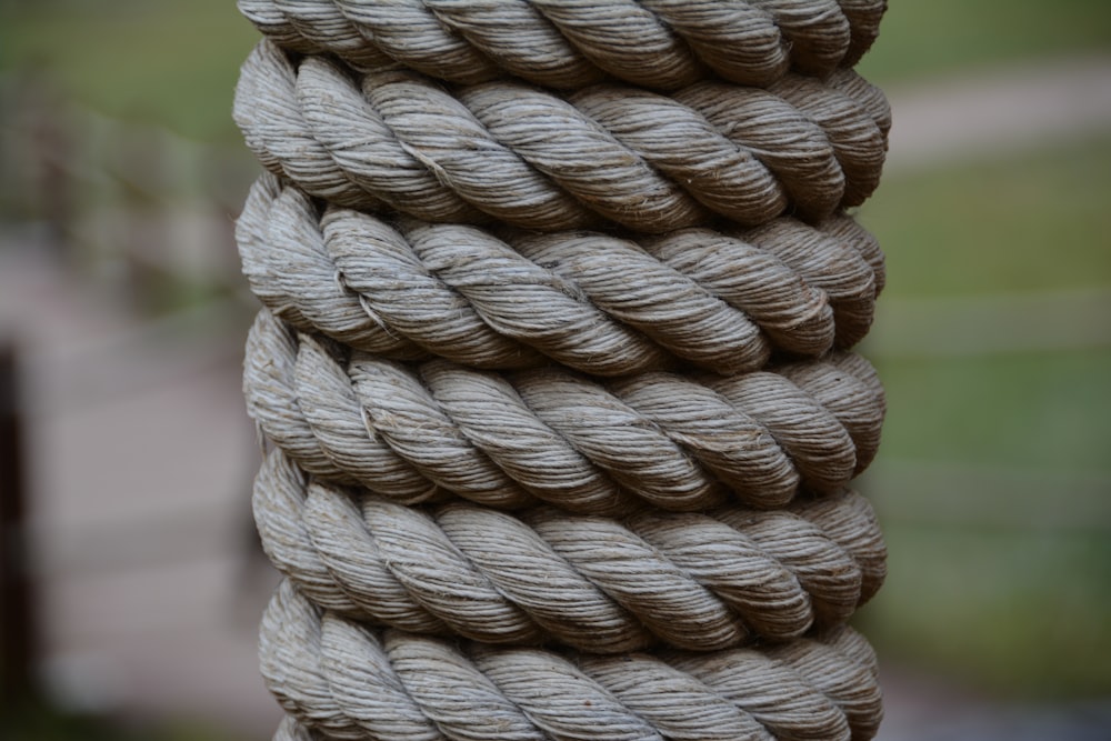 a close up of a rope with a blurry background