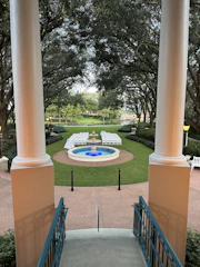 Elegant aerial view of a beautifully decorated communion event in a garden.