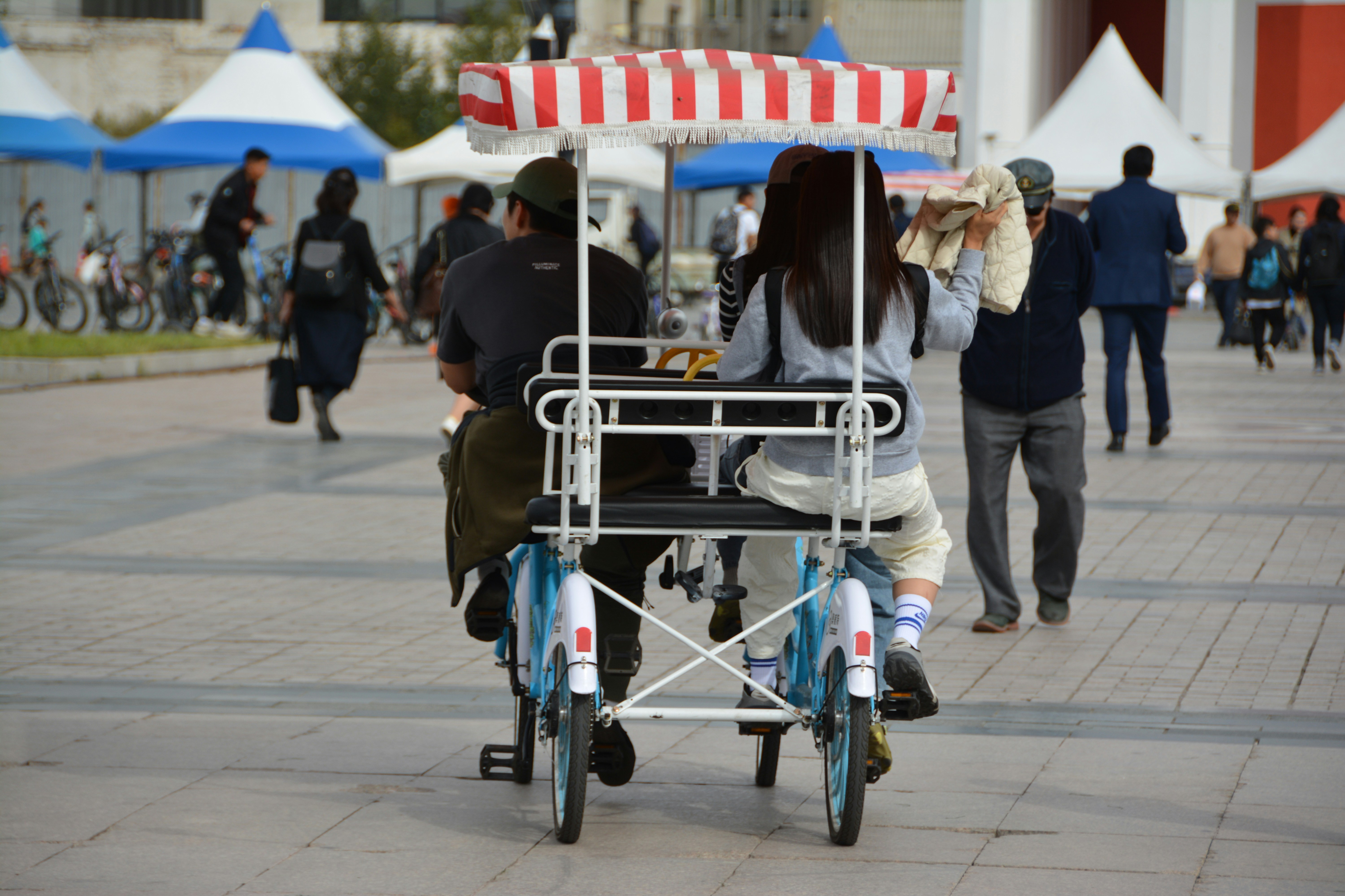 Couple cycling together