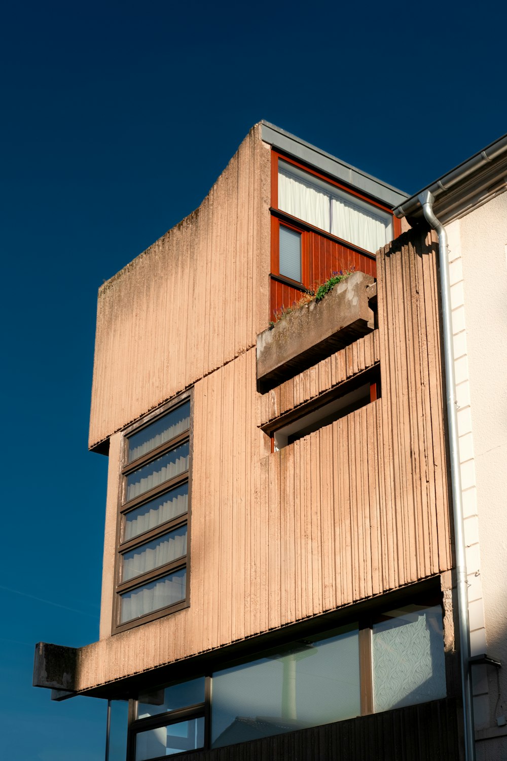 a building with a balcony and a balcony on the side of it