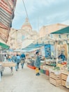 A vibrant local market showcasing fresh produce and crafts.