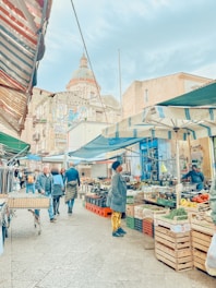A vibrant local market showcasing fresh produce and handmade crafts.