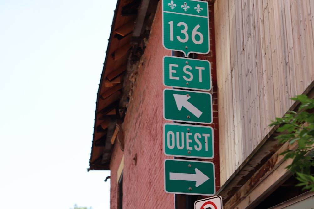 a street sign on the side of a building