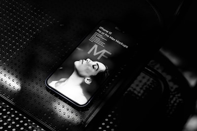 Modern mockup showing eaudvisor app on iPhone with elegant UI elements and soft lighting.