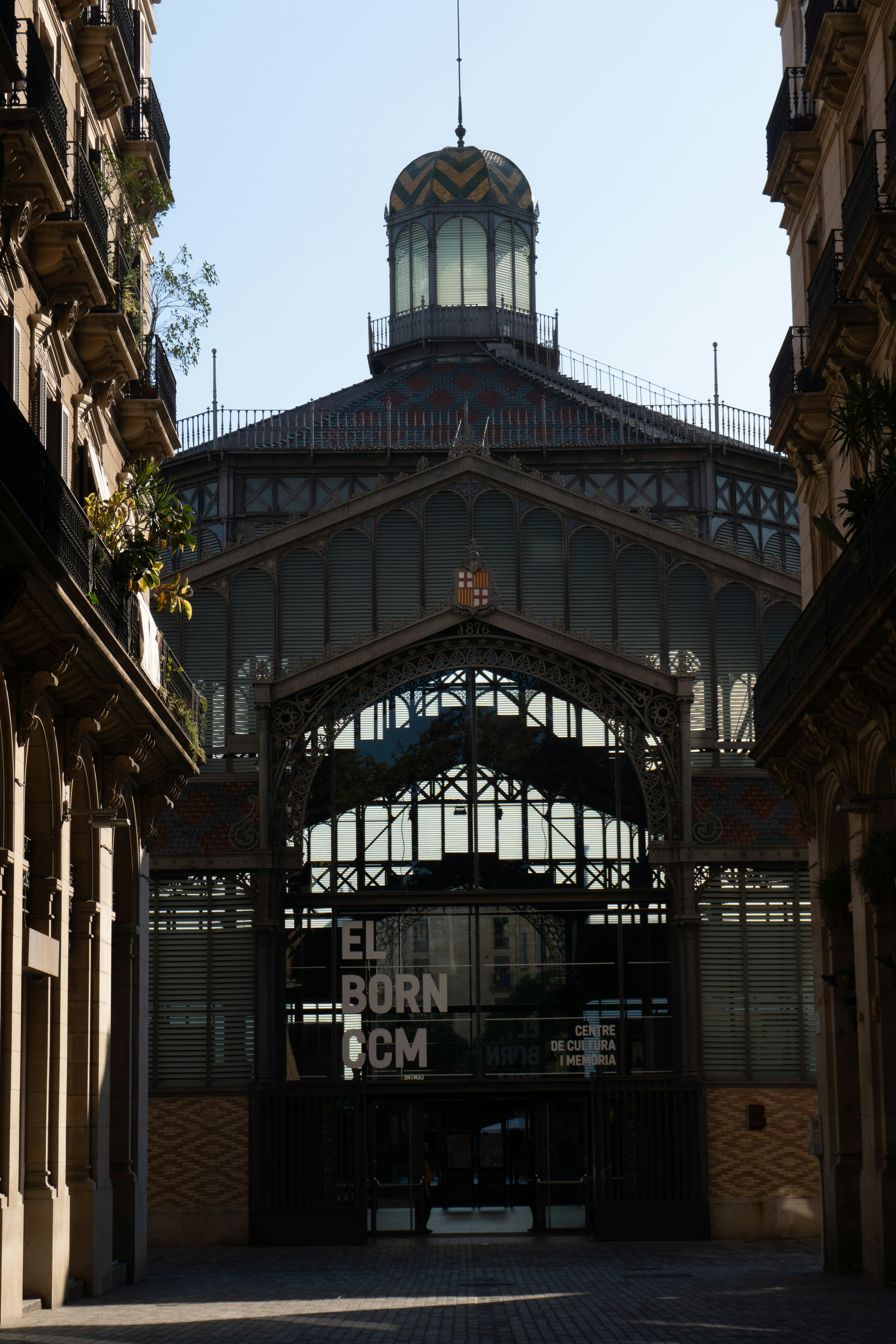 A large building with a clock tower on top of it photo – Free City ...