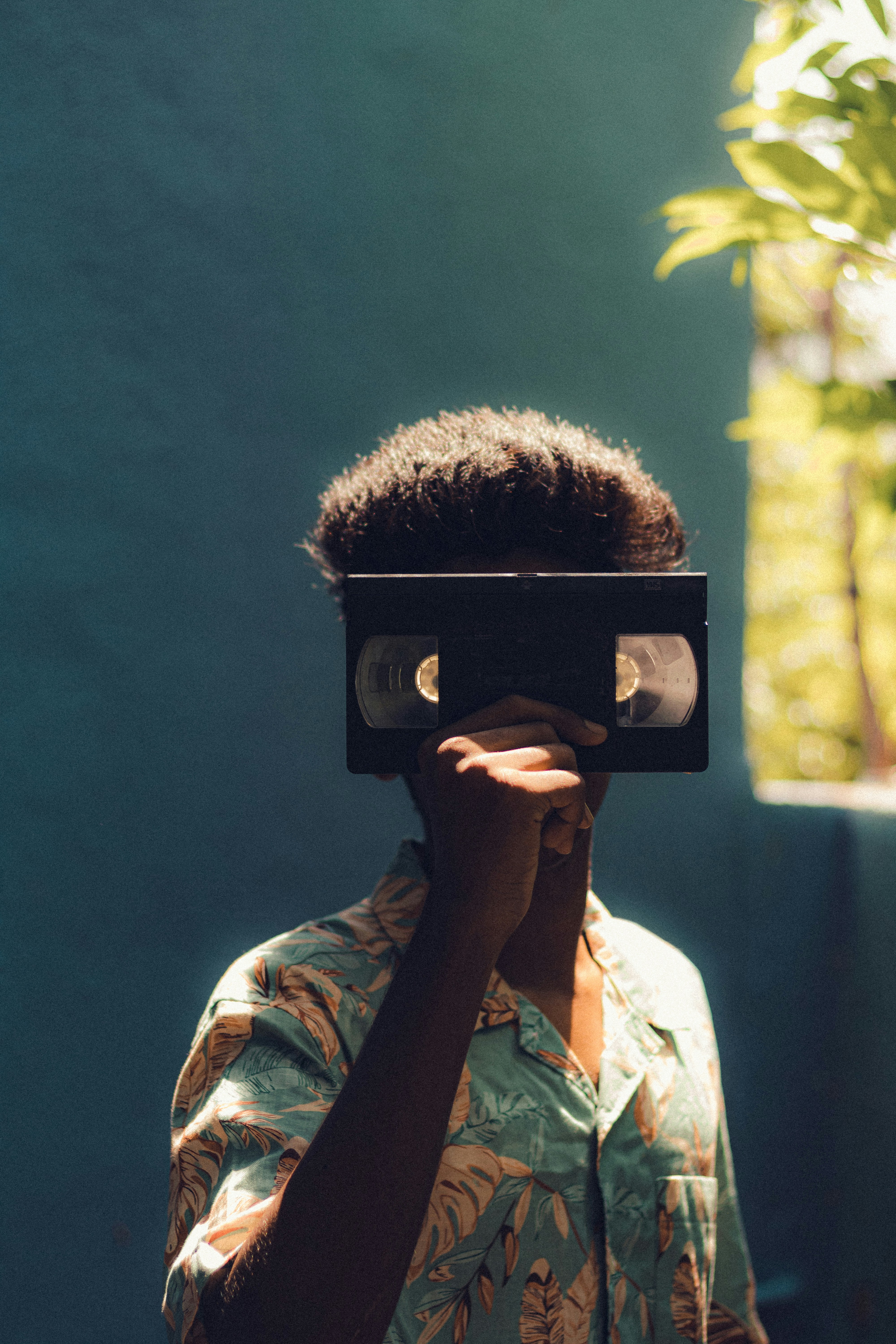 A man is using a video camera to take a picture photo – Free Wallpaper ...
