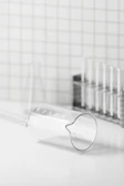 Close-up of precision glassware neatly arranged on a lab bench.