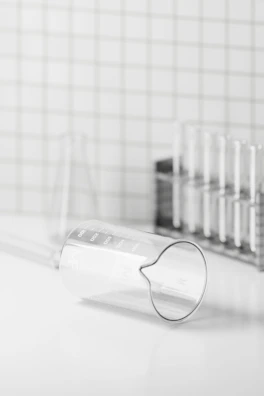 Close-up of precision glassware neatly arranged on a lab bench.