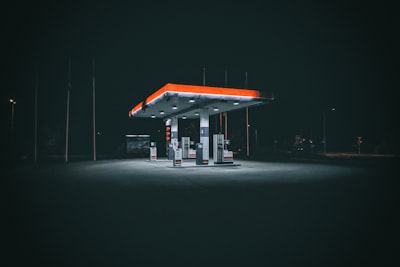 a gas station at night with no people around