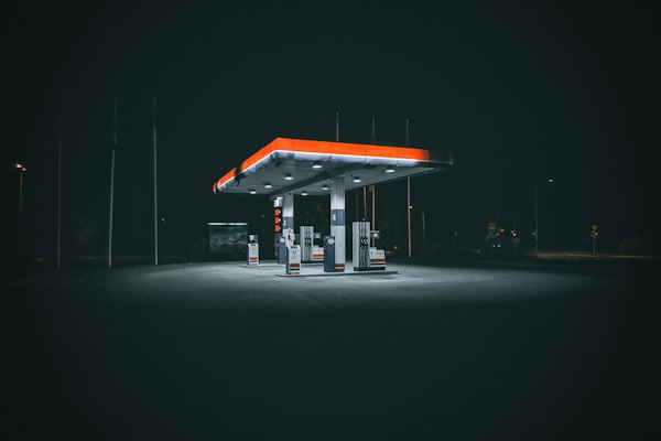 Gas station with fuel pumps and convenience store