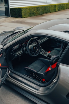 A luxurious car interior being detailed.