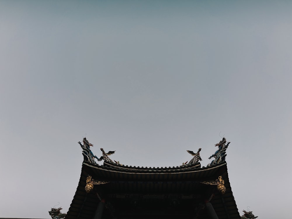 a tall building with a sky in the background