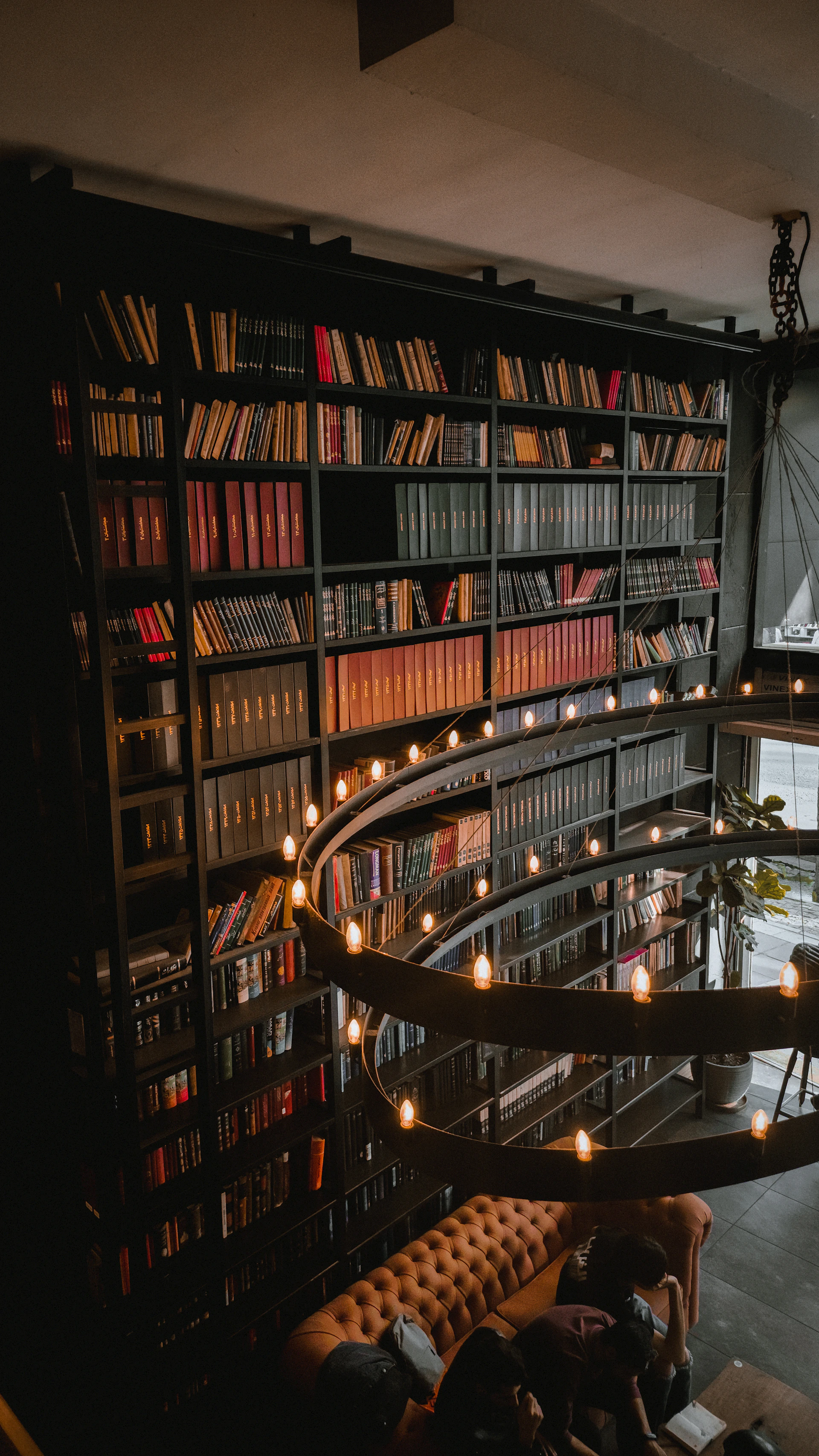 a living room filled with lots of books