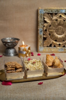 Close-up of crispy namkeens in decorative bowls ready for celebration.