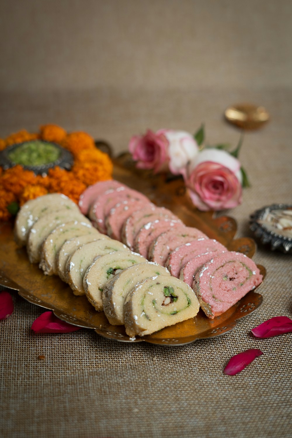 a plate of food with flowers on the side