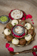 a plate of assorted desserts on a table
