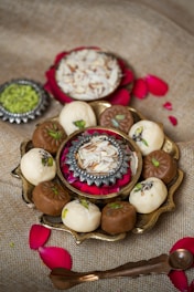 a plate of assorted desserts on a table