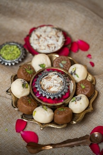 a plate of assorted desserts on a table
