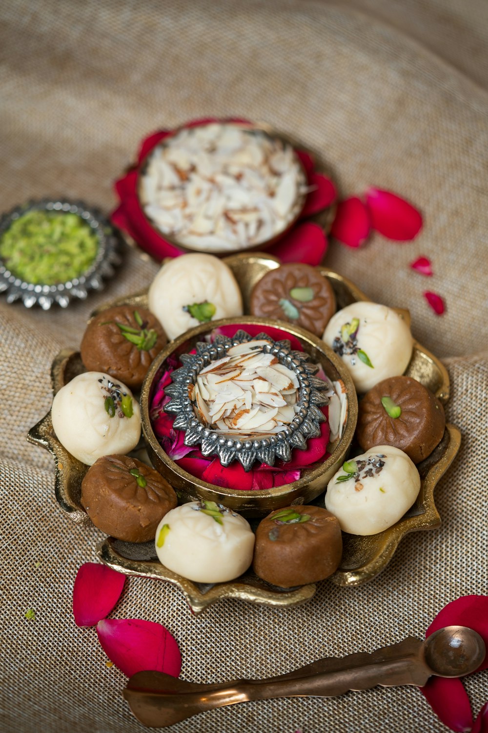 a plate of assorted desserts on a table