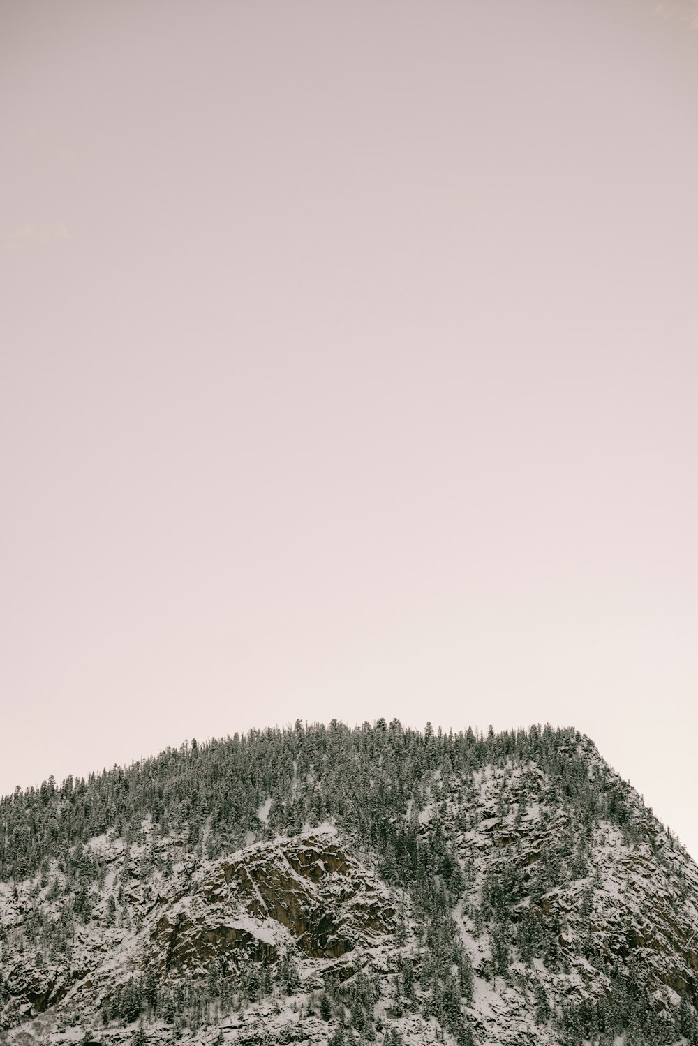 a snow covered mountain with a sky background