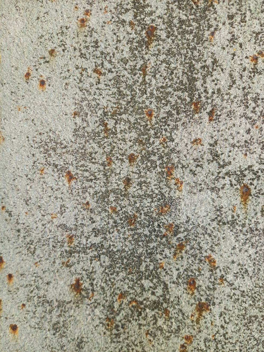 a close up of a rusted metal surface