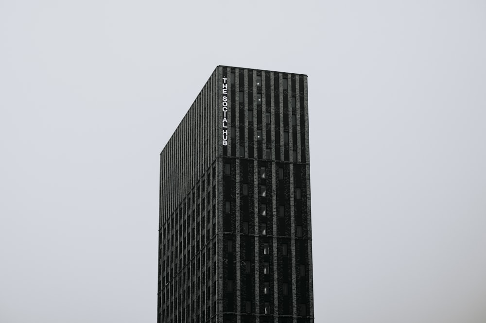 a very tall building with a sky background