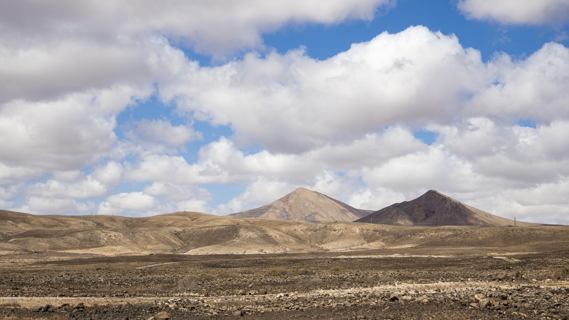 Southern Arizona border country with desert mountains and broken hills