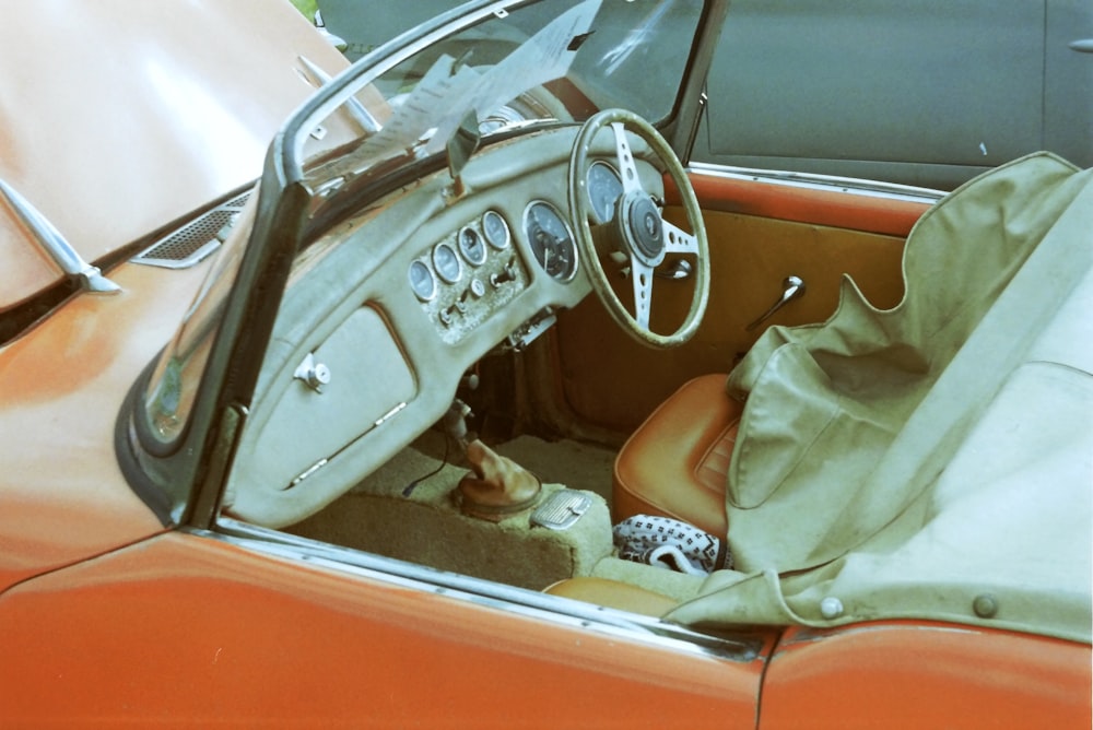 the interior of a car with a cloth covering the dashboard