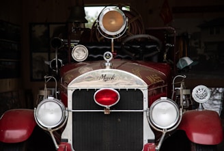 A vintage fire truck from the 1950s proudly displayed at the Quapaw Fire Department station.