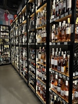 a store shelf filled with wine, spirit & RTD beverages.