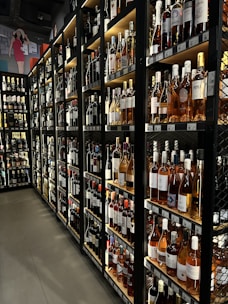 a store shelf filled with wine, spirit & RTD beverages.