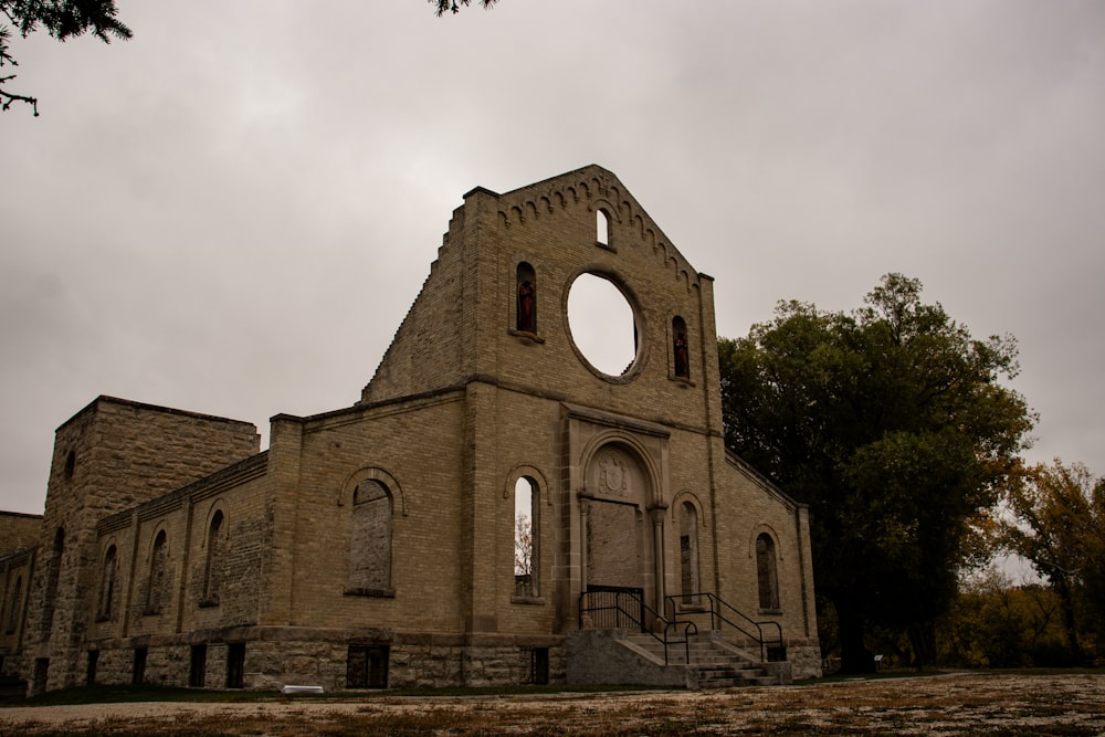 a very old church with a big window