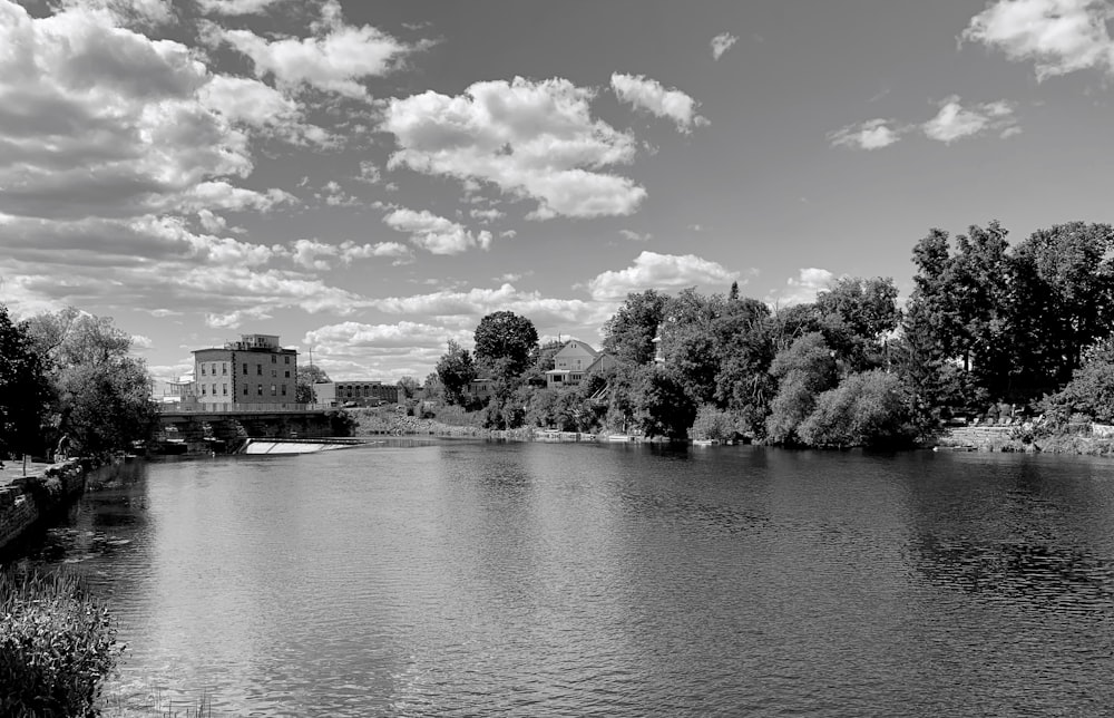 a black and white photo of a river