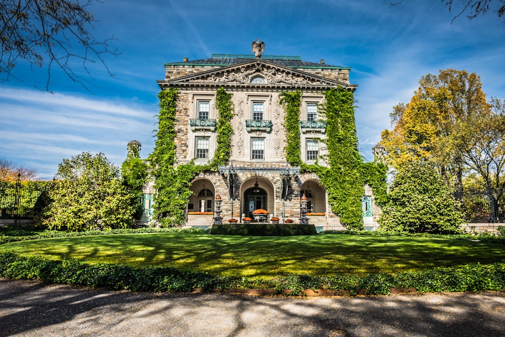 a large building with ivy growing on the side of it