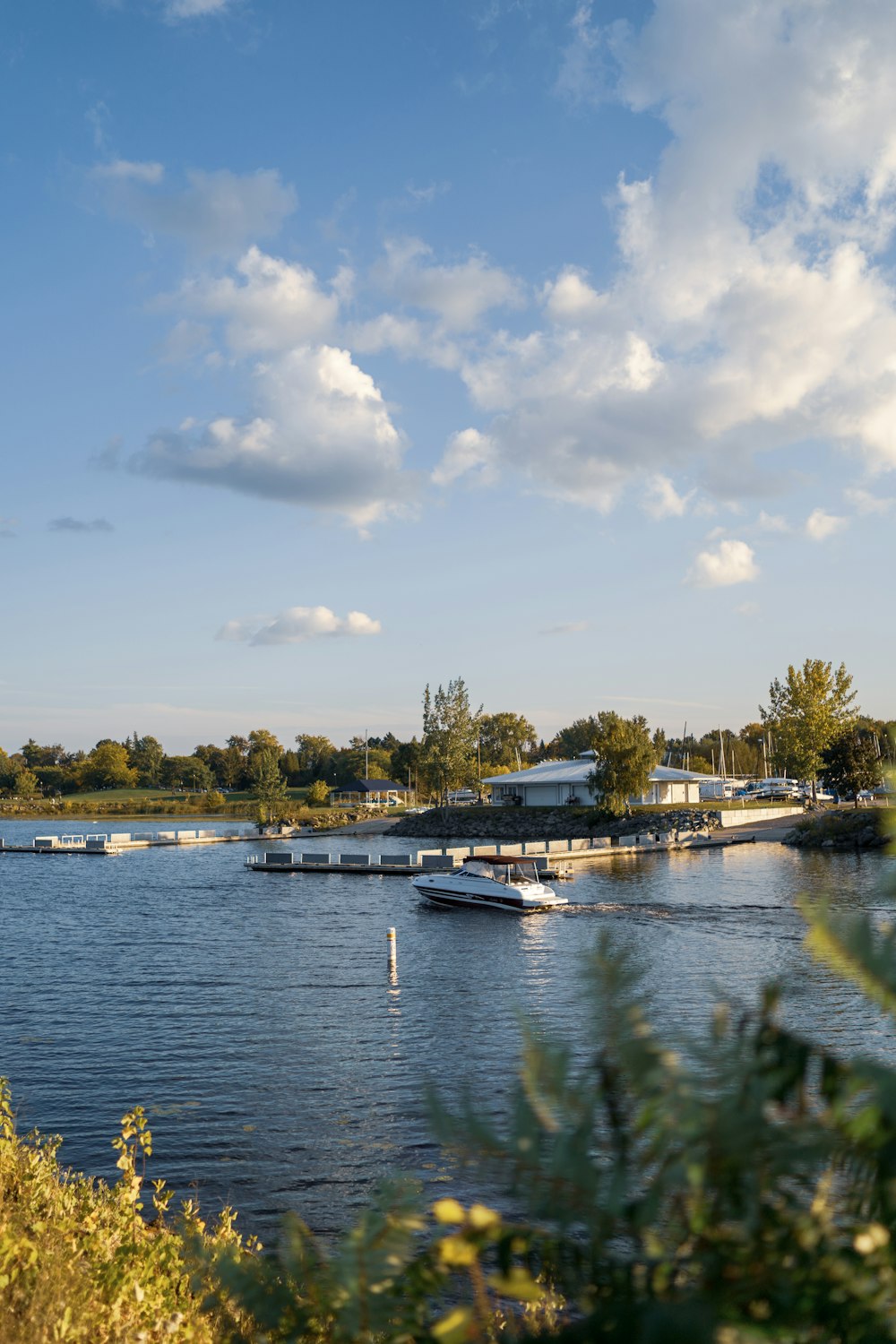 a body of water with boats floating on it